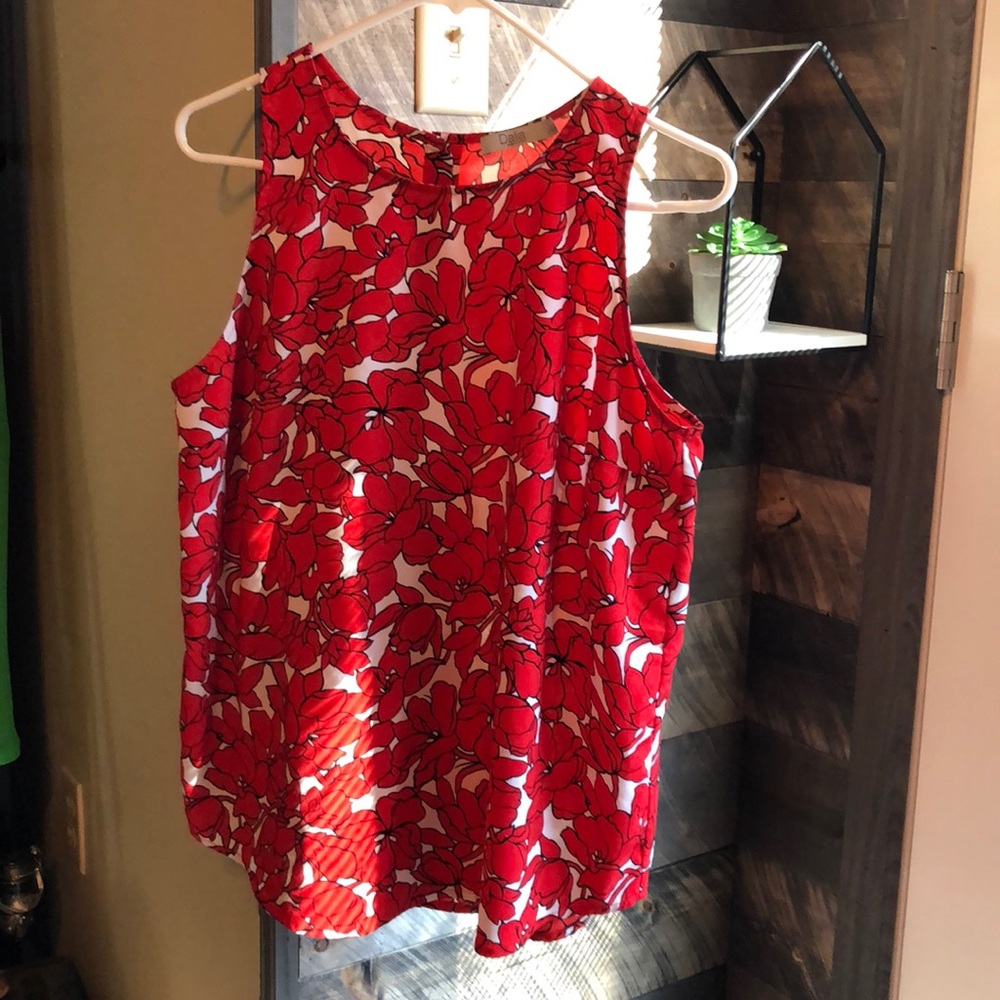 Red and white floral, sleeveless top.